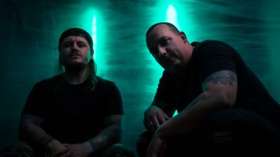 Australian deathcore duo AS PARADISE FALLS drop new music video “KFBR 329”